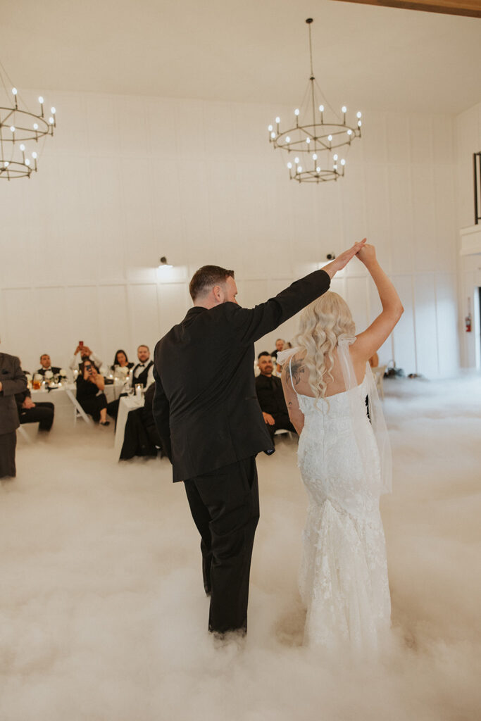 Bride and groom dancing at wedding