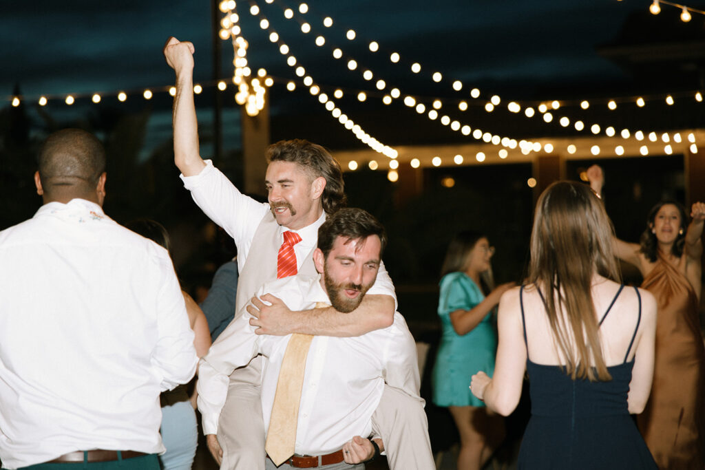 Wedding guests dancing at reception