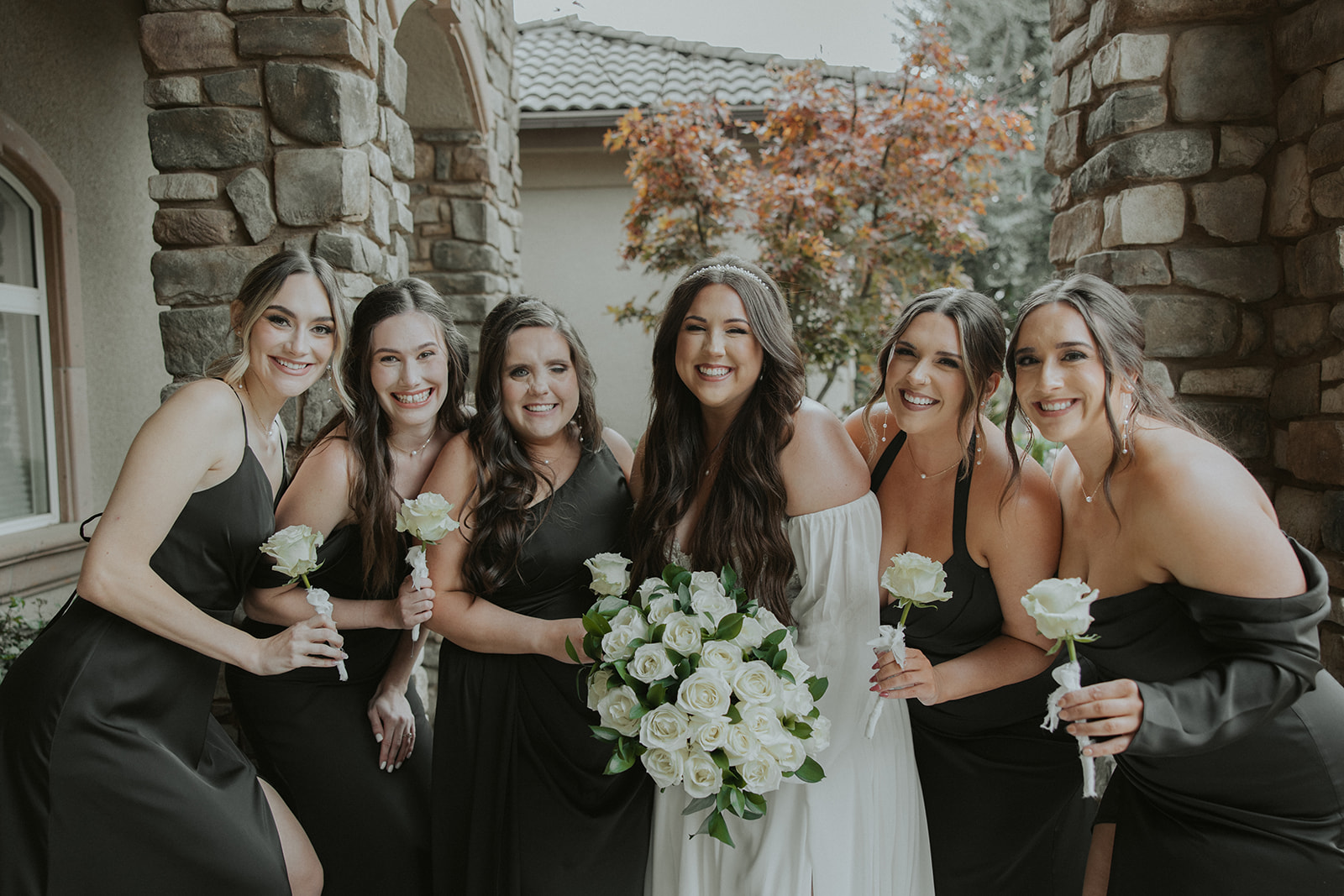 Bride and bridesmaids from a Tuscan Gardens wedding in Fresno County, California