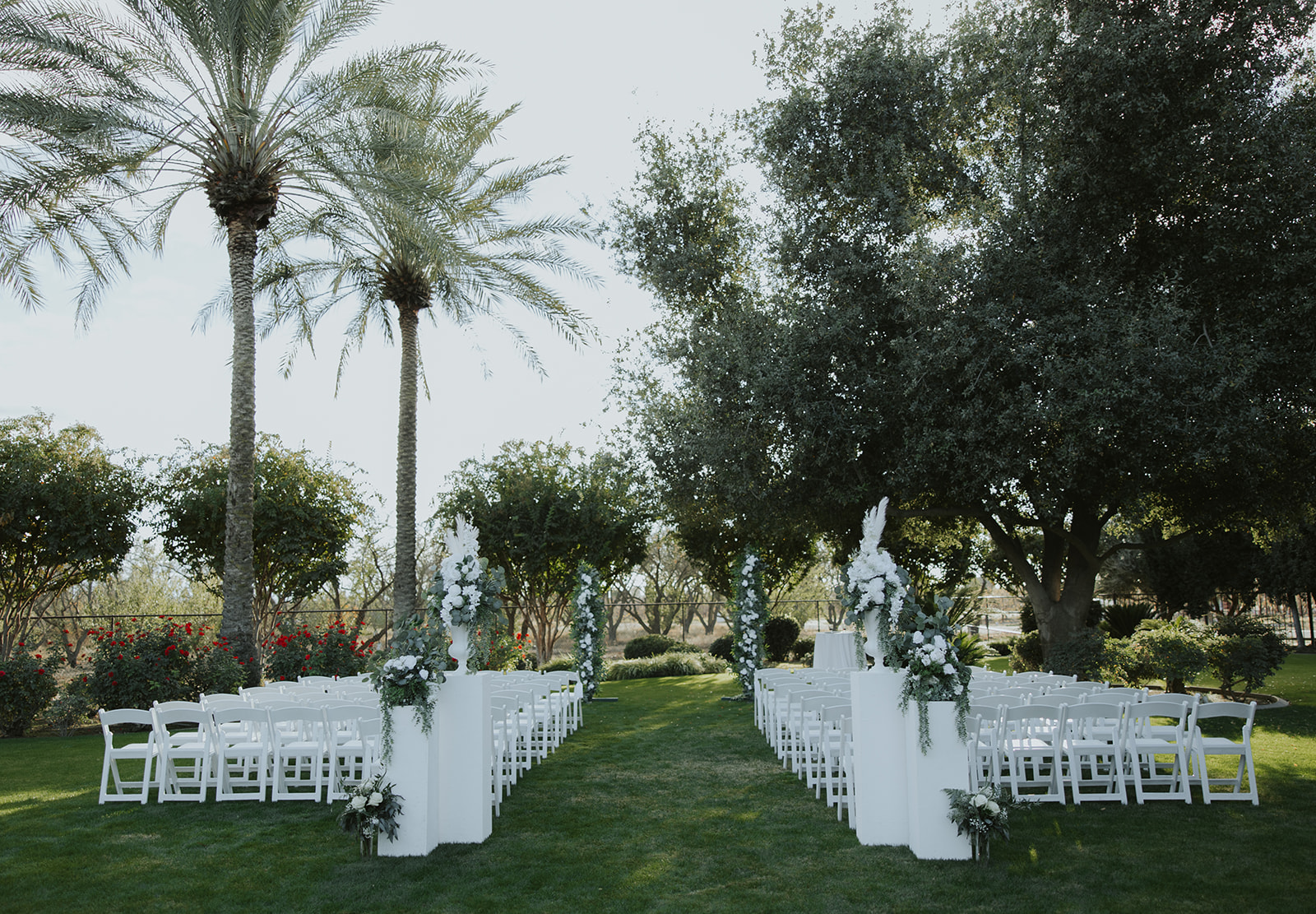 An outdoor Tuscan Gardens wedding ceremony in Fresno County, California
