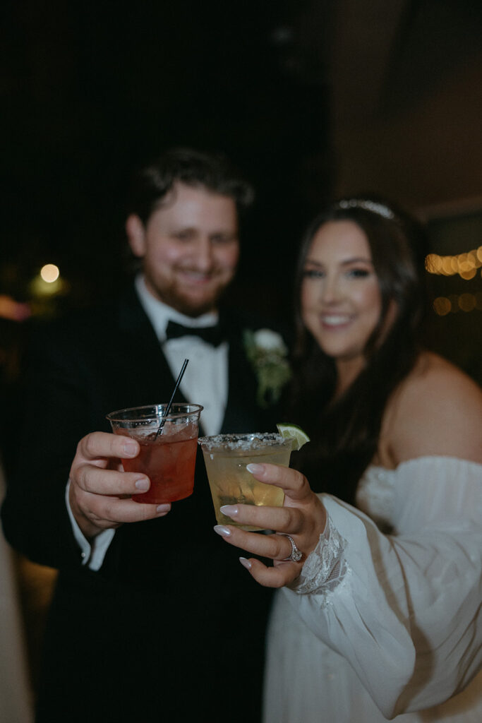 Bride and groom with mixed drinks