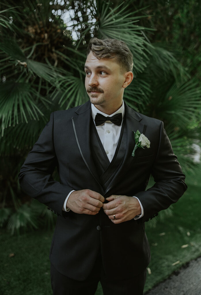 Outdoor groom portraits from a Oceanside Botanica wedding in SoCal