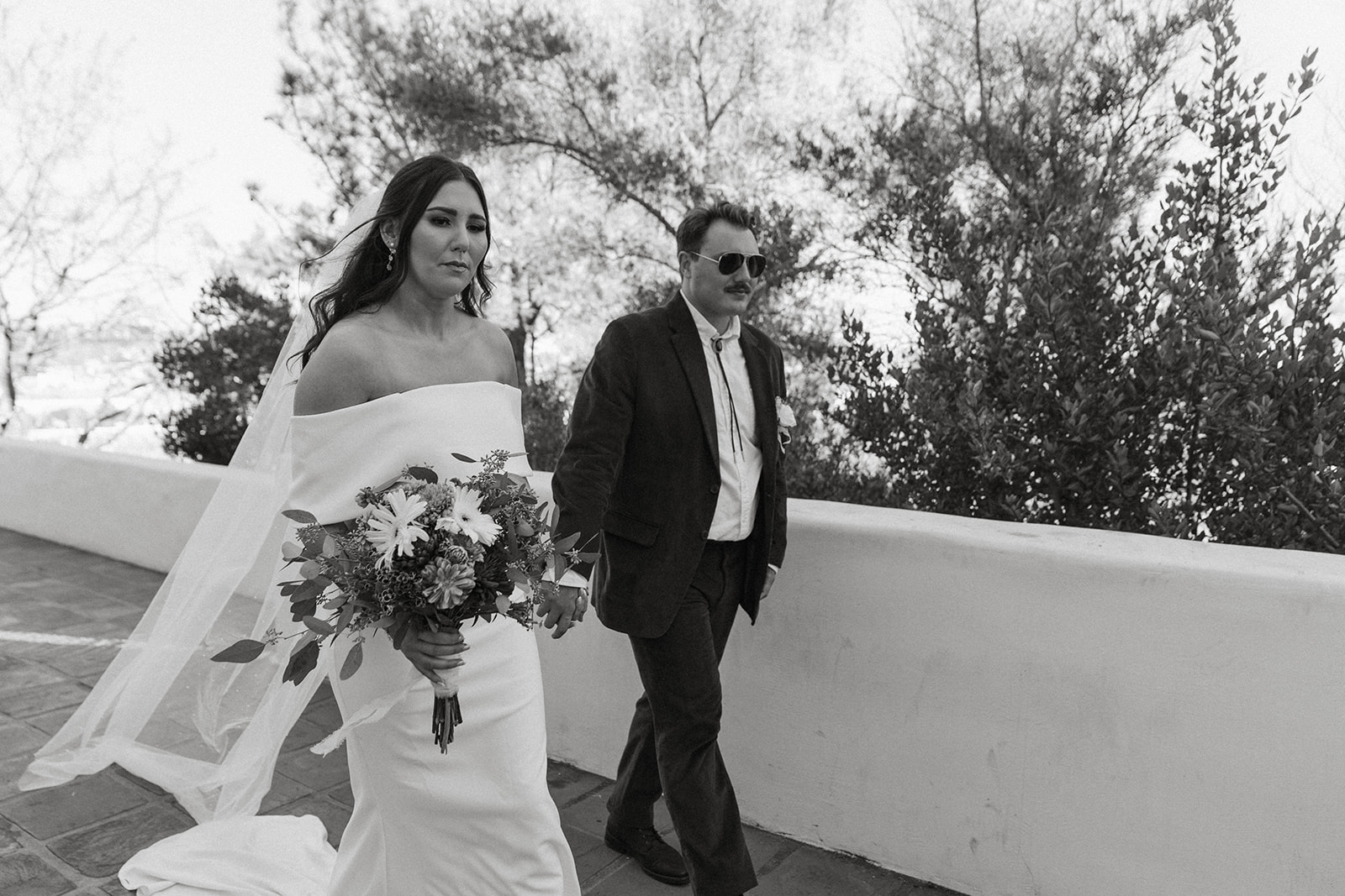 Bride and groom portraits from their San Diego wedding at The Junipero Serra Museum