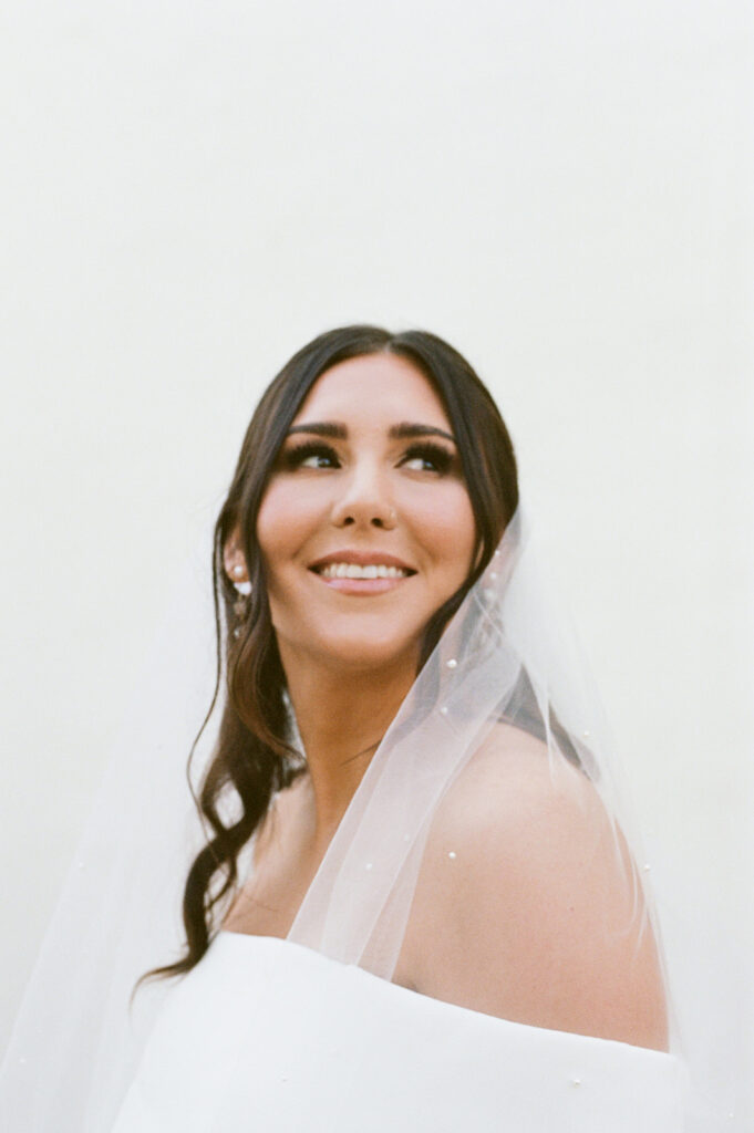 Bridal portraits on film from a San Diego wedding at The Juniper Serra Museum 